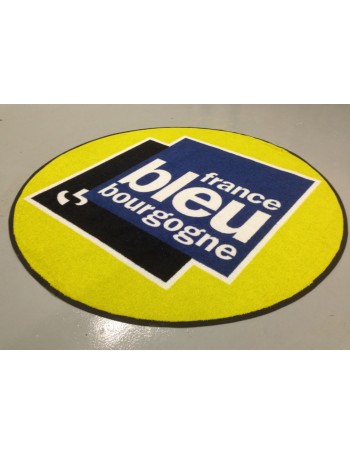 tapis publicitaire en forme de rond