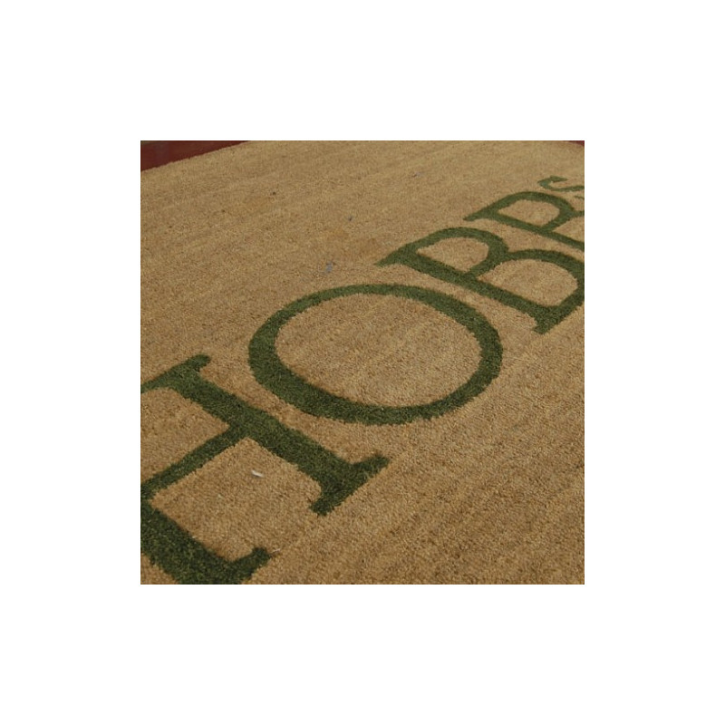 tapis coco avec découpe laser et incrustation de tapis brosse de couleur.